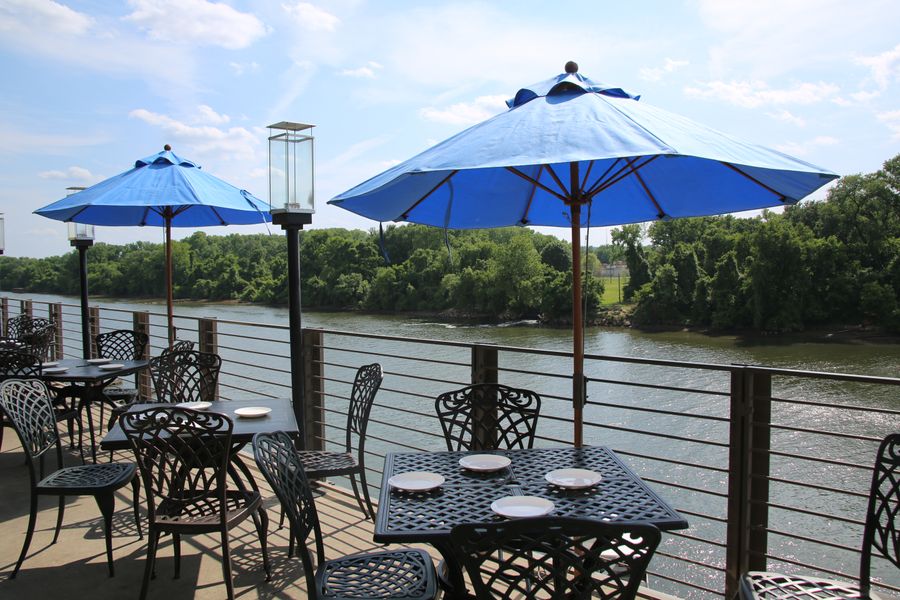 Outdoor patio dining at The Boathouse in Rocketts Landing, Richmond, Virginia. Our restaurant serves seafood, sandwiches, steak and more. 