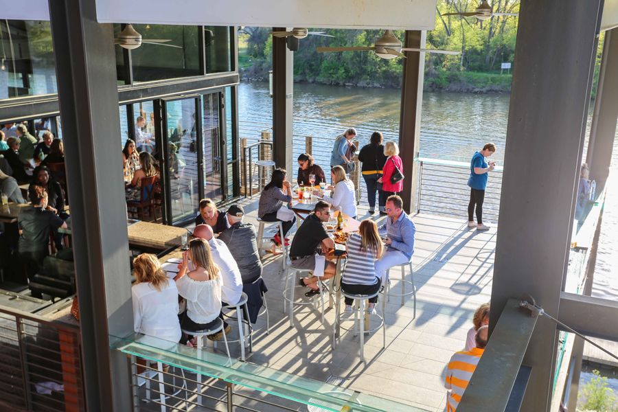 Rocketts Landing Atmosphere. For the best happy hour and wine list in Richmond, VA, visit The Boathouse at Rocketts Landing to dine in our beautiful building or on the stunning patio. 